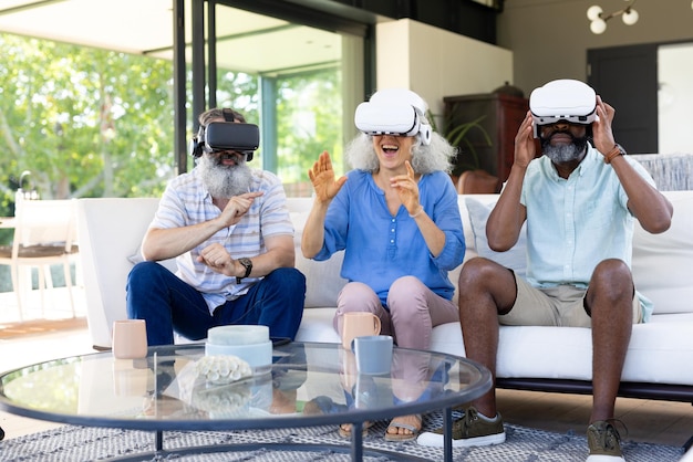 A group of people wearing VR headsets and interacting with each other in a virtual social space, representing the social aspect of VR gaming.