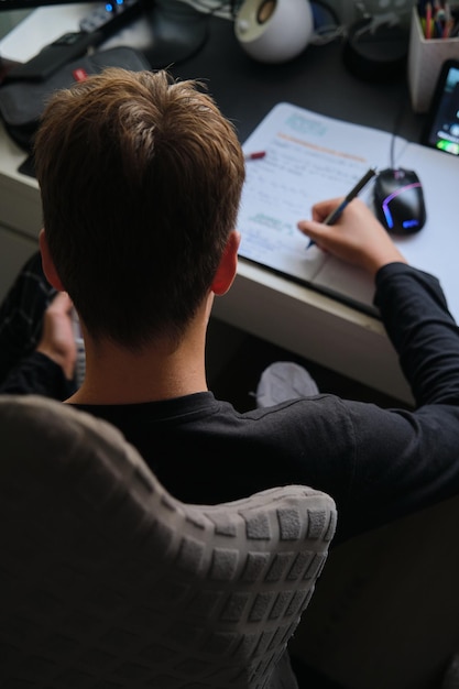 An image showing a player analyzing a game replay or data, highlighting the importance of continuous improvement.