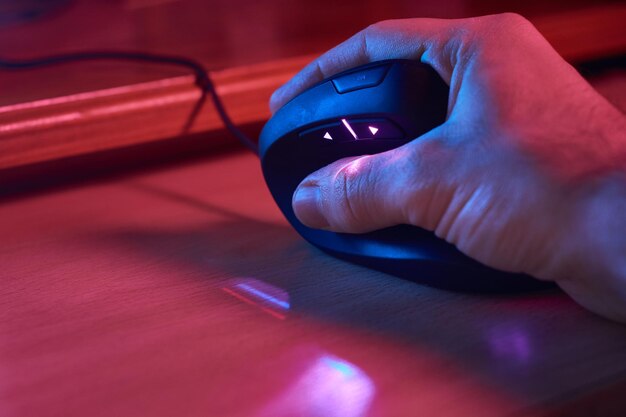 A close-up of a gamer's hands on a high-performance gaming keyboard, highlighting the precision and speed required for competitive gaming, with customizable RGB lighting adding to the visual appeal.