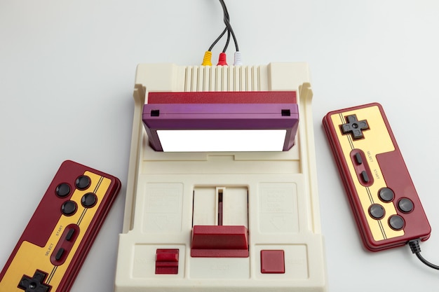 An image showcasing the Nintendo Switch Online interface, highlighting the classic NES and SNES games available, as well as the option to play online multiplayer with games like Mario Kart and Splatoon.