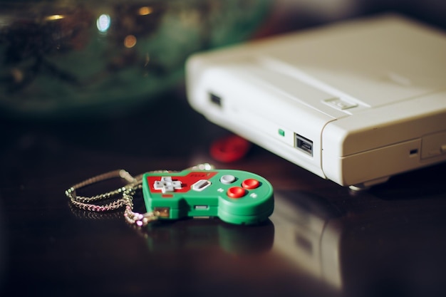 A comparative shot showcasing the same game running on an original retro console and a modern console through backward compatibility features, highlighting the improved graphics and resolution on the modern console.