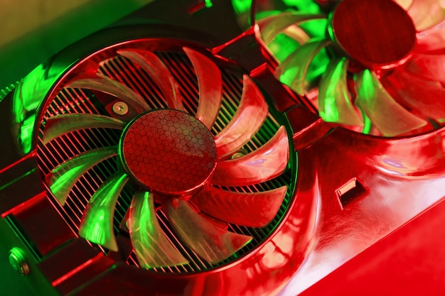 A photograph of a computer's cooling system, showing fans and heat sinks. The image should illustrate the importance of proper cooling for maintaining performance during gaming sessions.